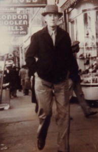 Mark Schieffelin walking on sidewalk with hat